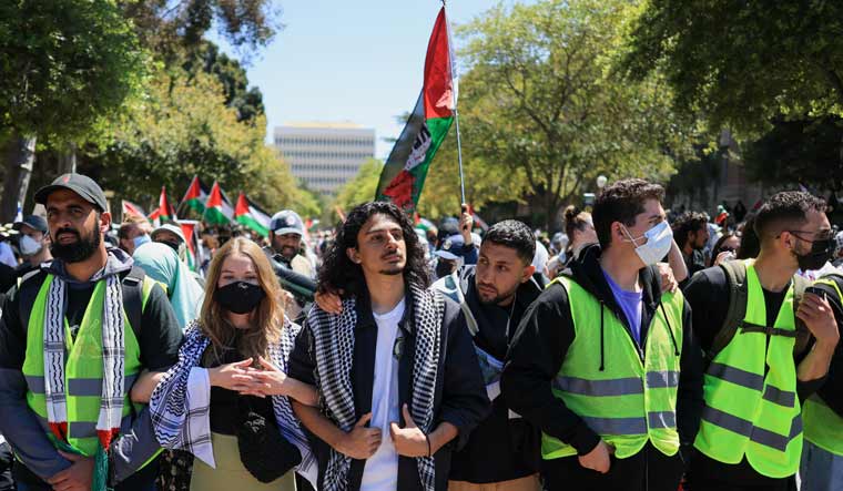 Protesters attend a demonstration in support of Palestinians in Gaza at the University of California Los Angeles in Los Angeles | Reuters 
