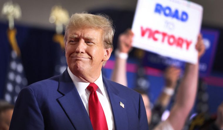 Former US President Donald Trump speaks to guests at a rally on April 2, 2024 in Green Bay, Wisconsin | Getty Images via AFP
