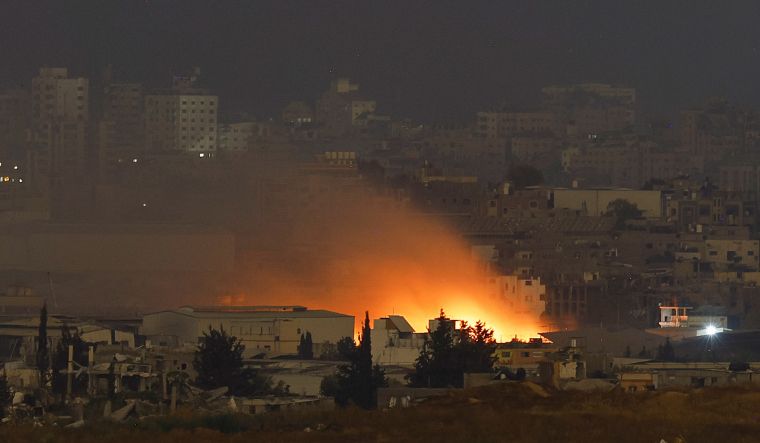 Smoke rises from a fire in Gaza, amid the ongoing conflict between Israel and the Palestinian Islamist group Hamas, near the Israel-Gaza border, as seen from Israel, May 26, 2024 | Reuters