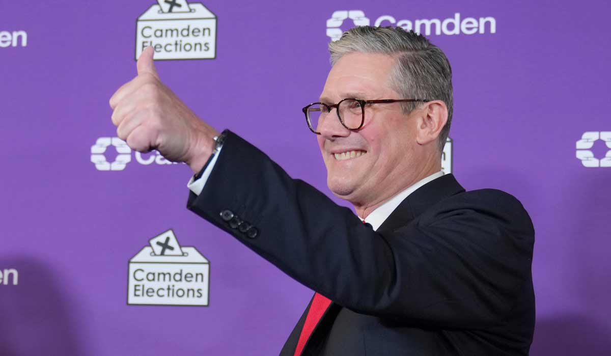 Britain's Labour Party leader Keir Starmer gives a thumbs up to his supporters after he was elected for the Holborn and St Pancras constituency in London | AP