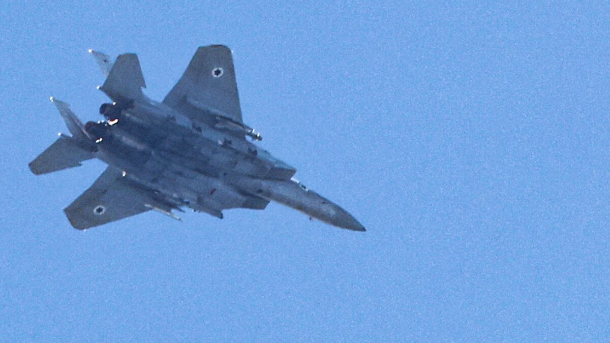 An Israeli Air Force F-15 Eagle fighter aircraft flies over Haifa | AFP