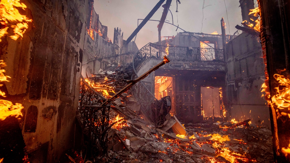 The Palisades Fire burns a residence in the Pacific Palisades neighborhood of Los Angeles | AP
