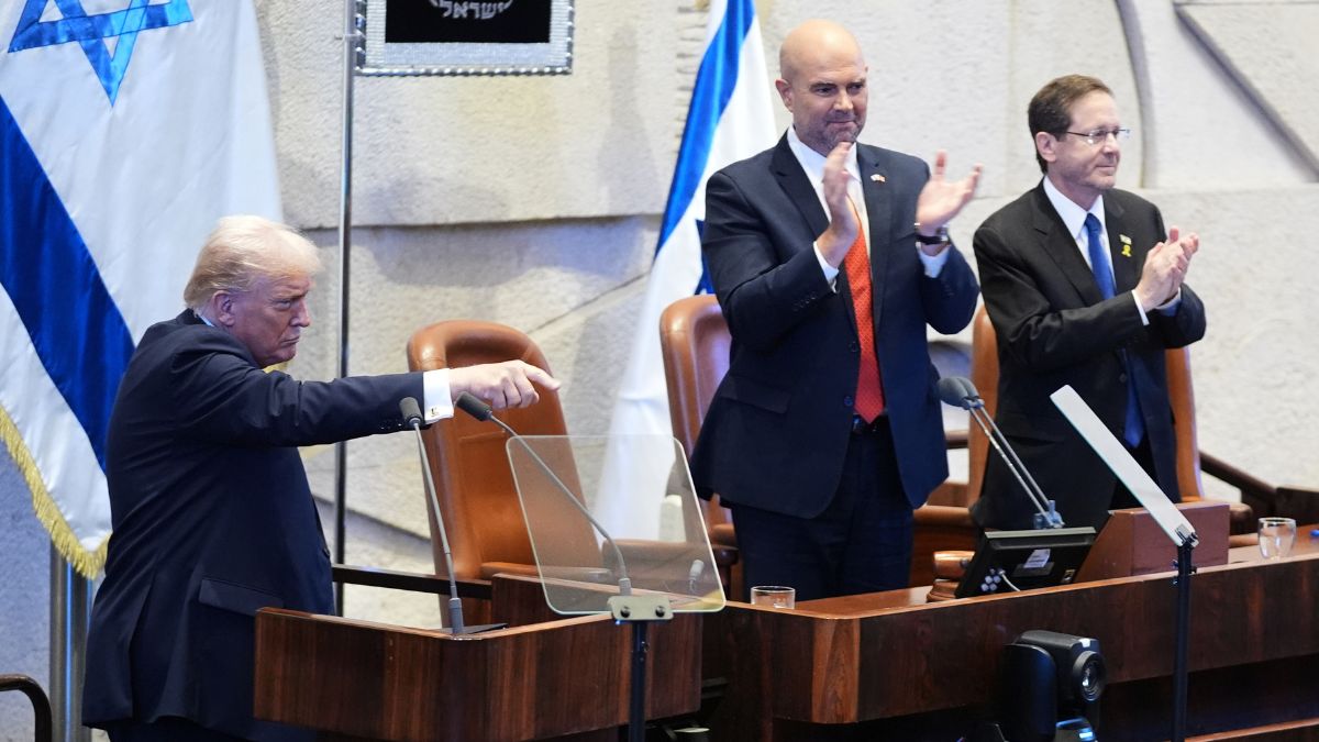 President Donald Trump gestures after speaking to the Knesset, Israel's parliament, Monday, Oct. 13, 2025, in Jerusalem, as Speaker Amir Ohana and Israel's President Isaac Herzog listen  | AP