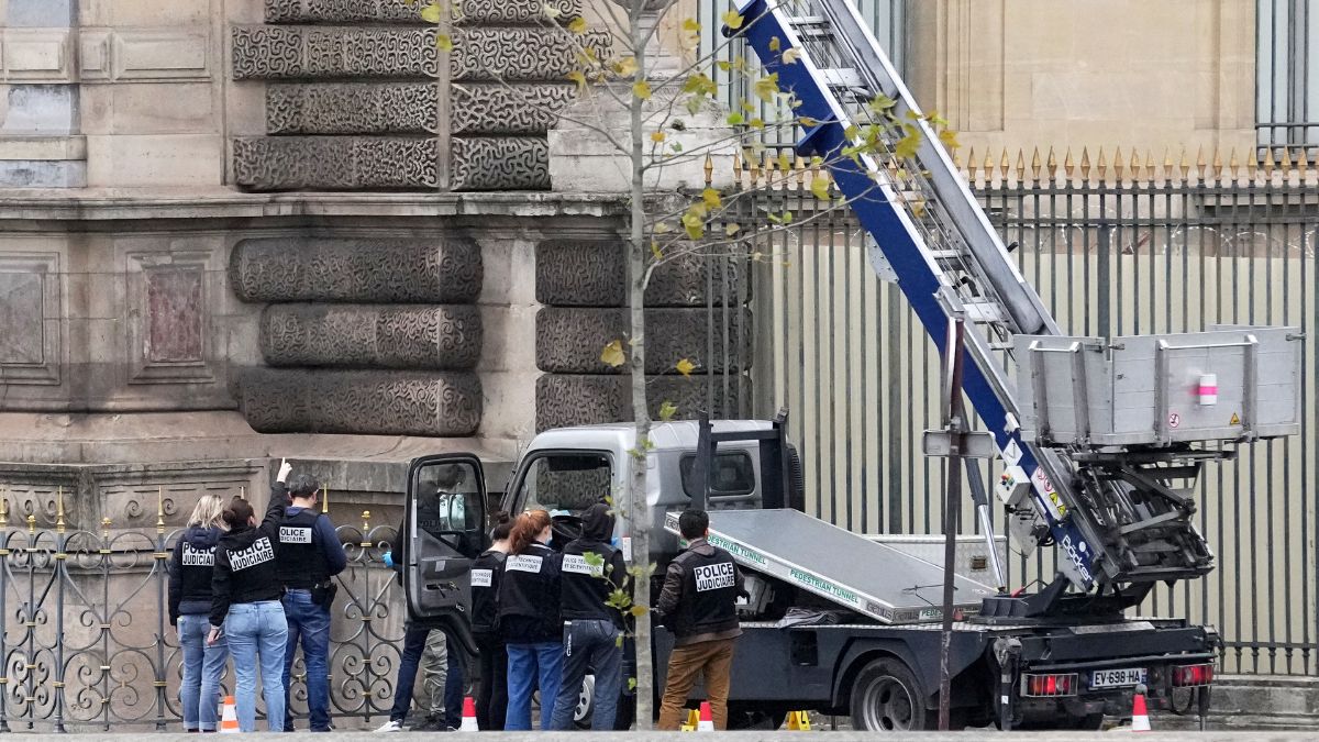 Police officers work by a basket lift used by thieves Sunday, Oct. 19, 2025 at the Louvre museum in Paris | AP 