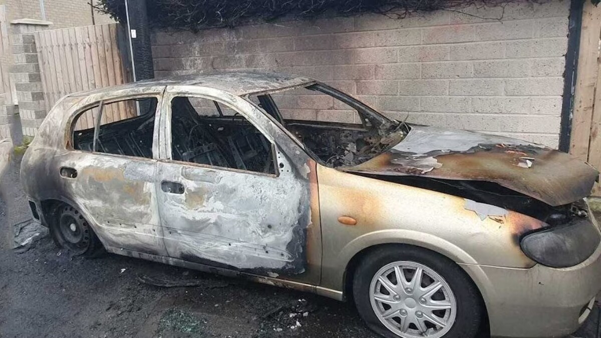 The family's car was set on fire by unidentified miscreants | Manorama