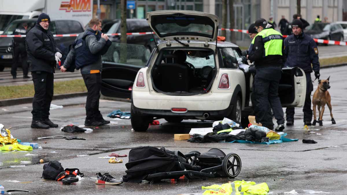 Police works at a car which drove into a crowd in Munich, Germany, on Thursday, injuring several people | Reuters
