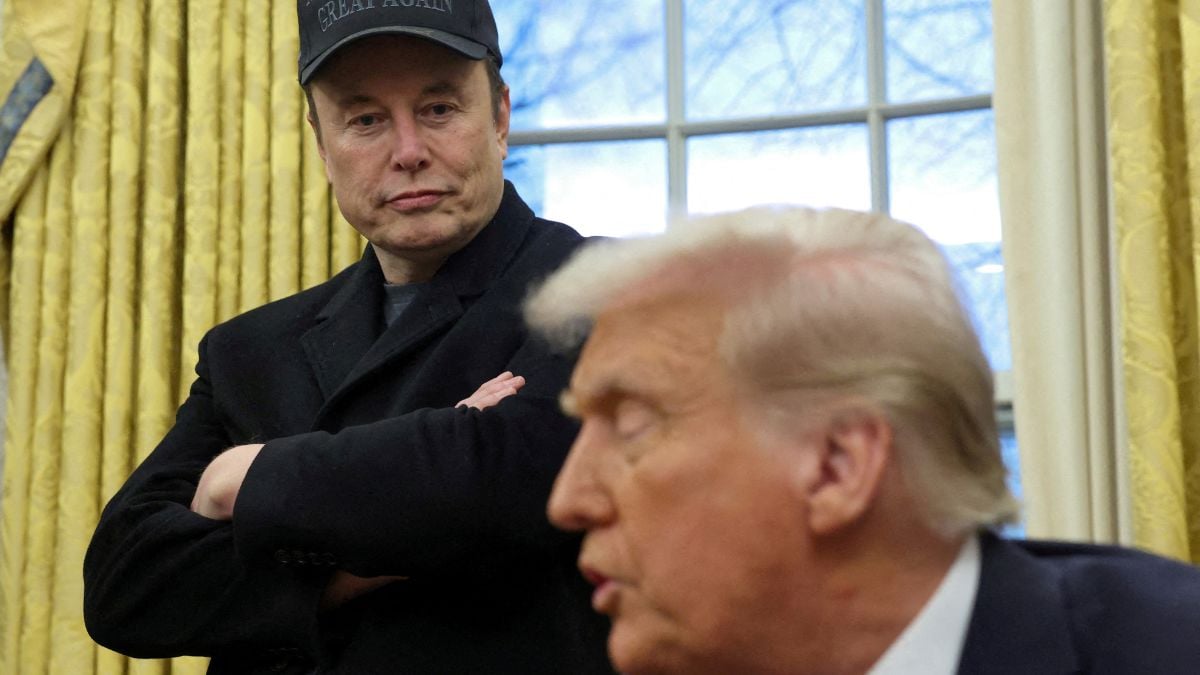 Elon Musk listens to U.S. President Donald Trump speak in the Oval Office of the White House in Washington, D.C. | Reuters