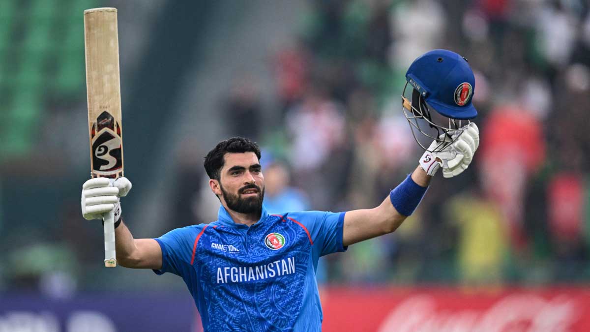 Afghanistan's Ibrahim Zadran celebrates after scoring a century in the ICC Champions Trophy match against England at the Gaddafi Stadium in Lahore | AFP