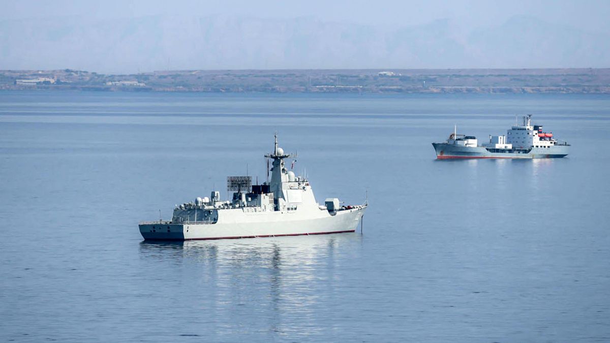 This handout photo made available by the Iranian Army Office on March 10, 2025 shows the Chinese People's Liberation Army Navy guided-missile destroyer Baotou (133) (L) during joint military drills between Iran, Russia, and China in the Gulf of Oman | AFP 