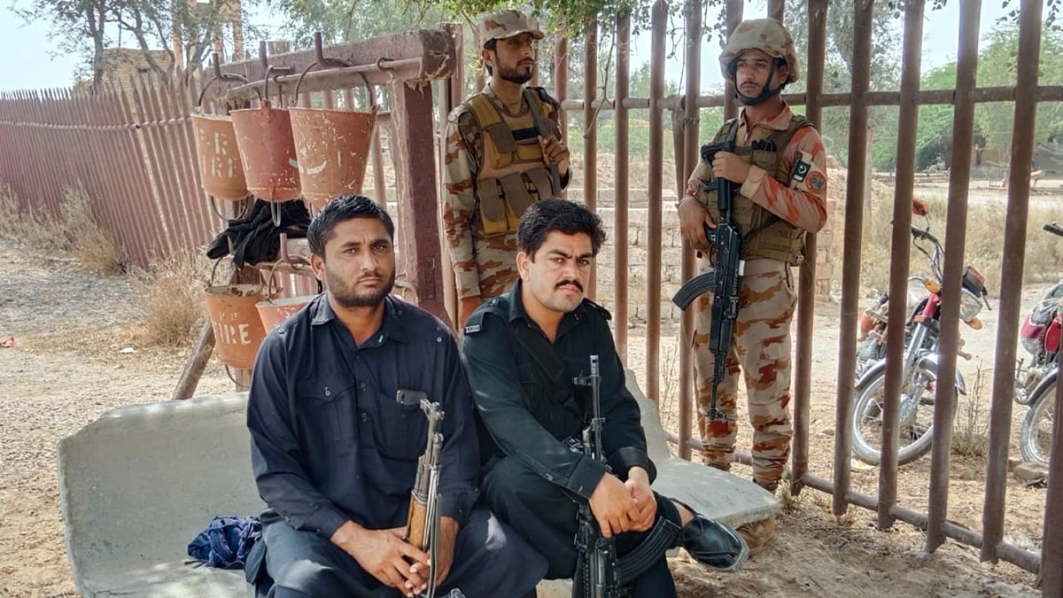 Pak paramilitary soldiers and police officers stand guard in Balochistan province | AP