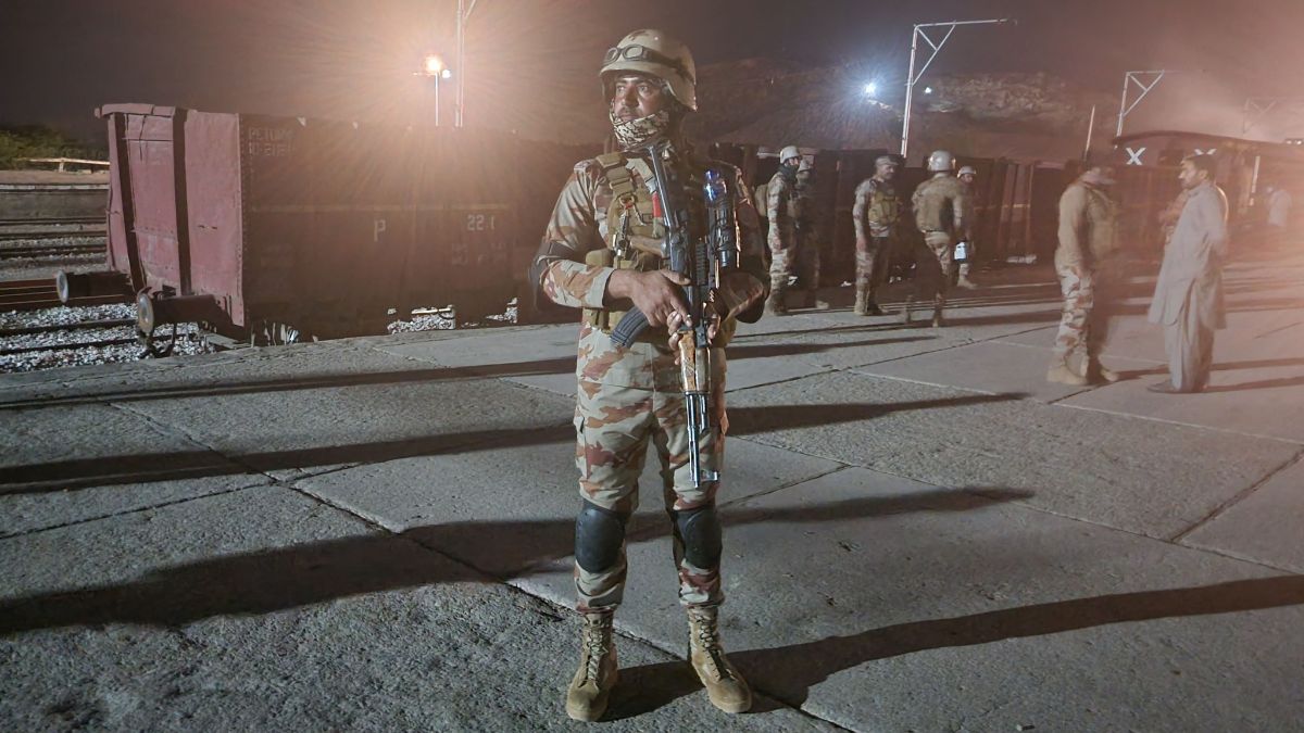 Pakistani soldiers secure Mach railway station after Pakistani security forces freed nearly 80 passengers following a security operation against armed militants who ambushed the train in the remote mountainous area, in Mach, southwestern Balochistan province on March 11, 2025 | AFP
