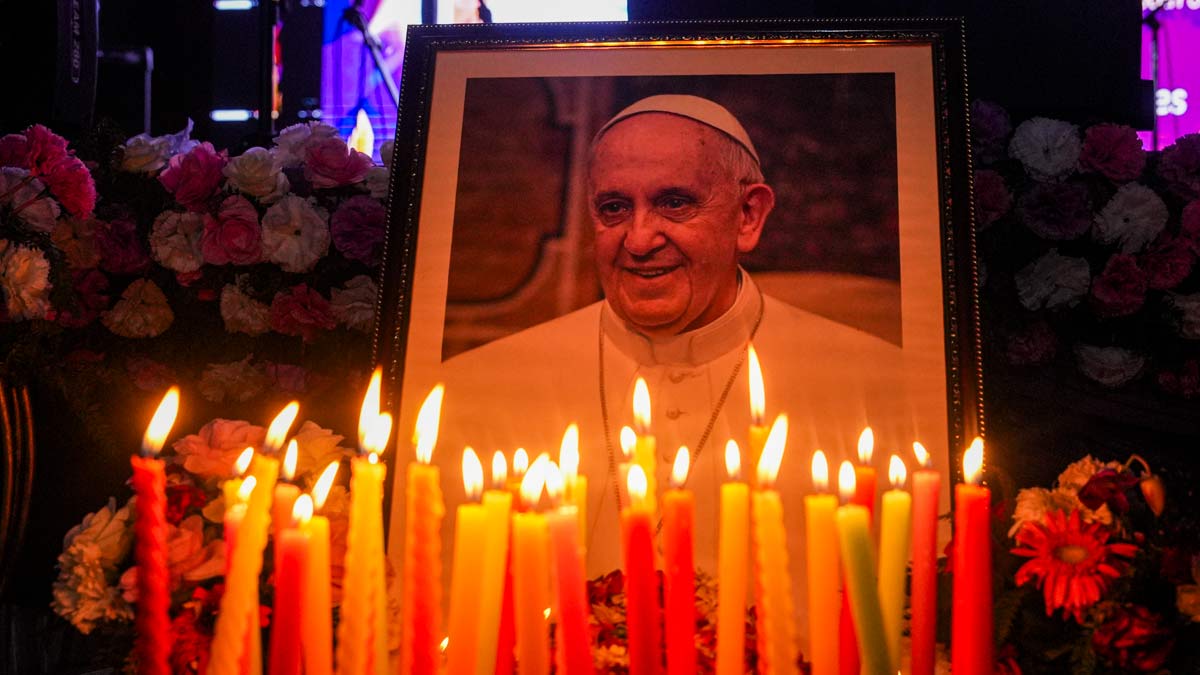 Candles being lit during a condolence meeting held to pay tribute to Pope Francis, organised by CBCI and Delhi's Chavara Cultural Centre in New Delhi | PTI