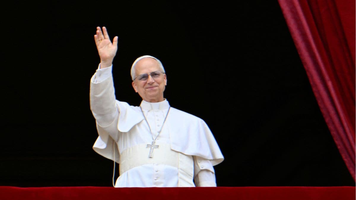 Pope Leo XIV greets the crowd during the Regina Caeli prayer from the main central loggia of St Peter's basilica in The Vatican, on May 11, 2025 | AFP