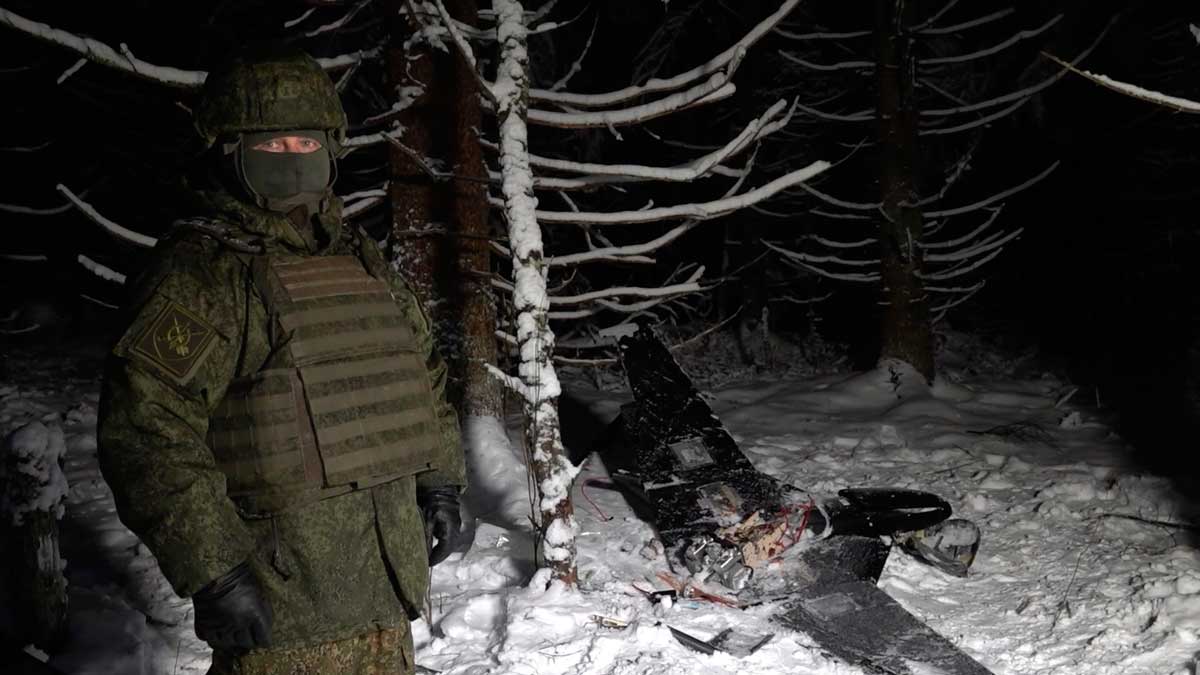 The image made from undated video provided by the Russian Defense Ministry Press Service on Wednesday shows a man in camouflage standing by a downed drone at an undisclosed location | AP