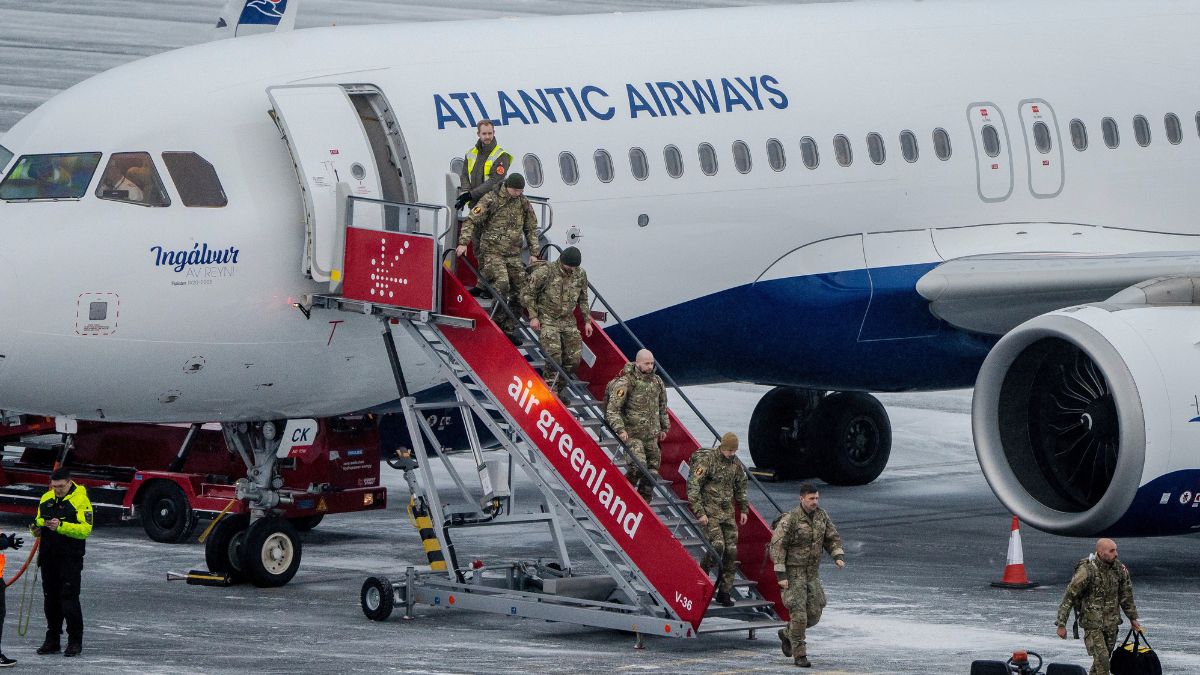 Danish soldiers disembark an airplane at Nuuk airport, Greenland | AFP