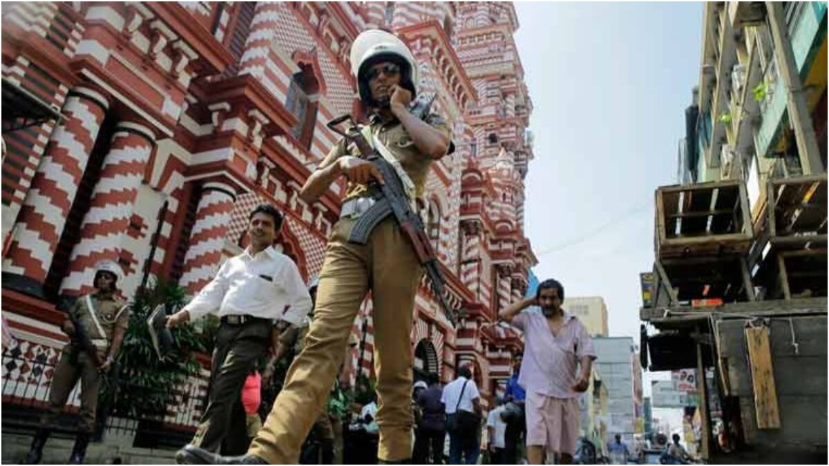 A Sri Lankan police officer patrols out side a mosque in Colombo, Sri Lanka | AP