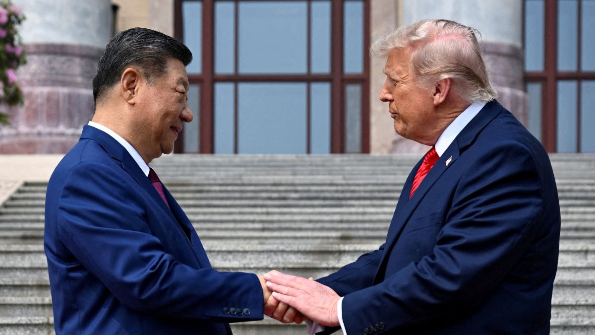 US President Donald Trump participates in events at the Great Hall of the People and does a greeting with the President of the People’s Republic of China Xi Jinping | Reuters