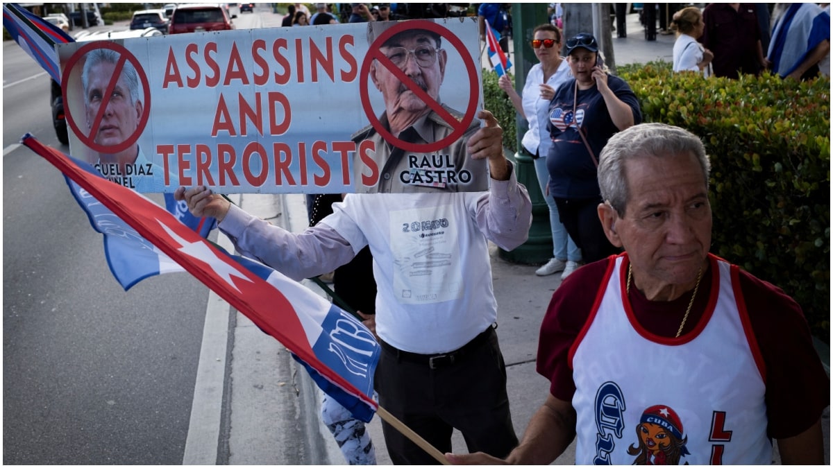 A gathering outside Versailles Cafe after the U.S. Department of Justice announced criminal charges against former Cuban President Raul Castro | Reuters