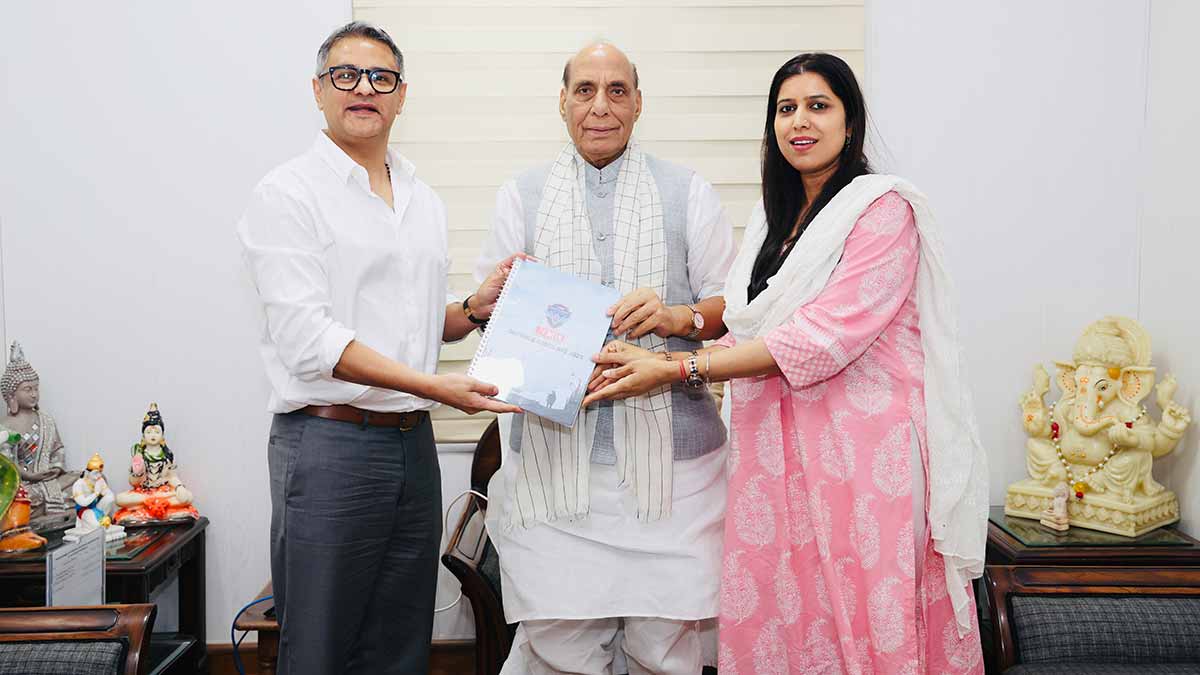THE WEEK Chief Associate Editor and Director Riyad Mathew and Chief of Bureau (Delhi) Namrata Biji Ahuja present the report of THE WEEK Defence Conclave to Defence Minister Rajnath Singh.