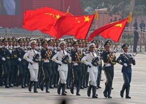 Chinese soldiers march to commemorate the 70th anniversary of the founding of Communist China in Beijing | AP