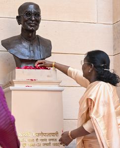 President Droupadi Murmu pays floral tribute to the bust of C Rajagopalachari, during its unveiling at Rashtrapati Bhavan | PTI