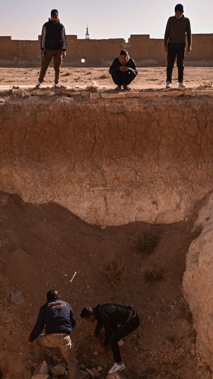 PHOTOS | Over 100,000 bodies recovered from a mass grave in Syria