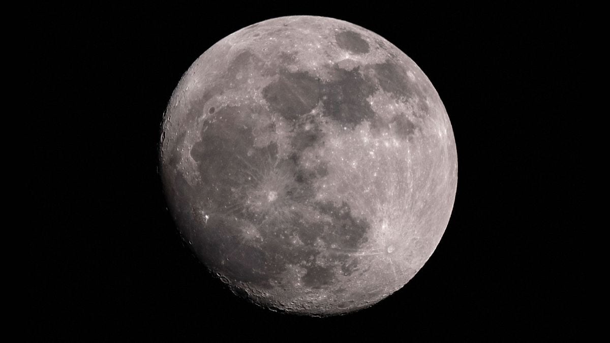 The Waxing Gibbous moon rises in the sky over Bogota on August 17, 2024 | AFP